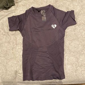 Women’s Best workout top. M